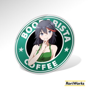 May include: A green and white circle with the text "Boo barista coffee" and a star on each side. A woman with black hair and a red ribbon is in the center of the circle, wearing a green apron and smiling.