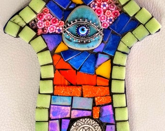 A colorful handmade and one of a kind Hamsa with glass, beads and polymer clay flowers  for home decoration