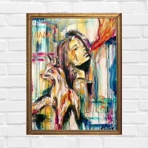 May include: Abstract painting in a gold frame. The artwork depicts a woman with a fox, rendered in vibrant colors including orange, blue, and yellow. The painting has a modern, expressive style with visible brushstrokes and drips.