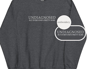 Undiagnosed But Everyone's Pretty Sure Funny Quote EMBROIDERED (white thread) Unisex Cozy Oversized Sweatshirt