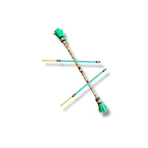 May include: Two flow wands featuring a long, slender rod design. One wand is wrapped in a multi-coloured striped pattern, while the other is solid light blue with yellow ends. Both wands have a light green tassel at one end and striped accents.