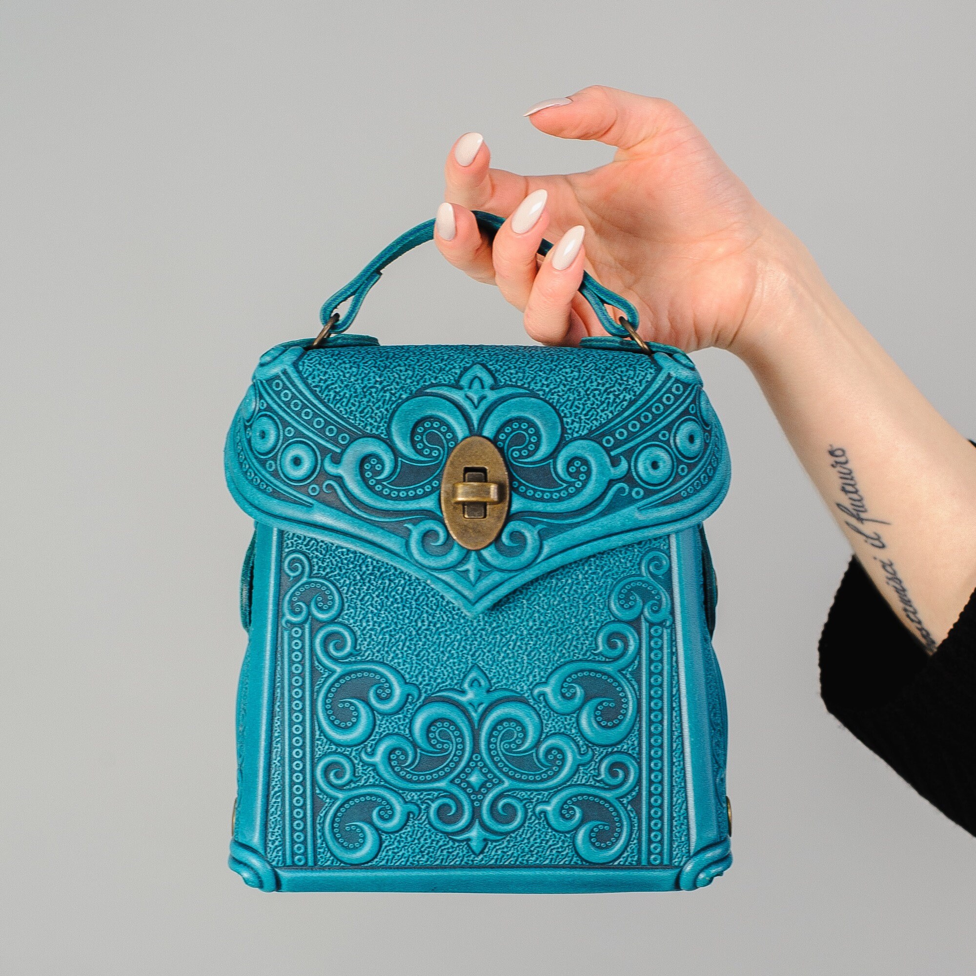 Turquoise Embossed Leather Backpack: Small Convertible Bag  display picture 2