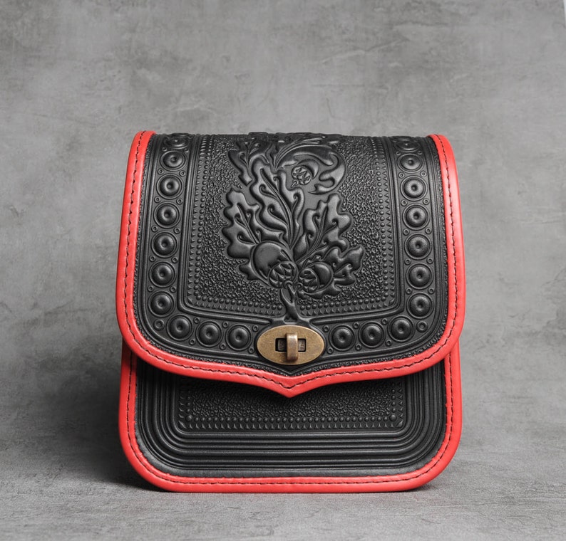 black tooled leather bag