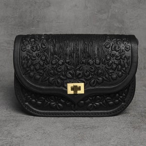 Small black pocketbook shop