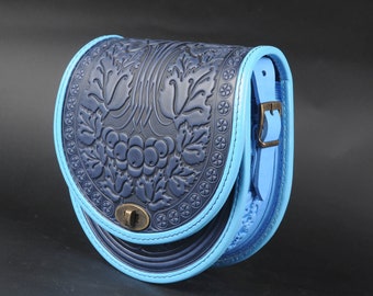 Bolso bandolera de piel azul: bolso bandolera redondo con relieve