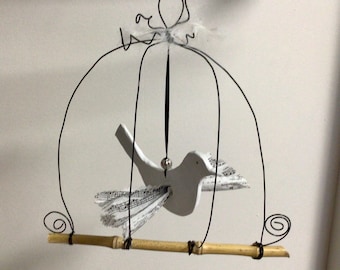 Annealed wire caged ceramic bird