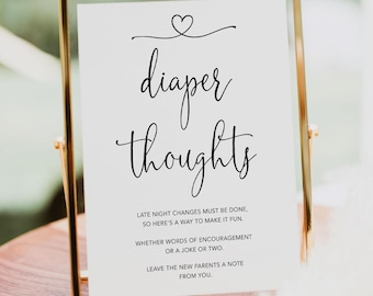 May include: A white sign with black text that reads "diaper thoughts". The sign is in a gold frame and has a small heart at the top. The text below the title reads "Late night changes must be done, so here's a way to make it fun. Whether words of encouragement or a joke or two. Leave the new parents a note from you."
