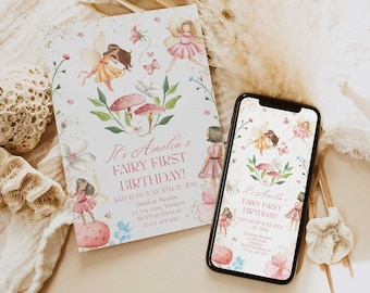 May include: A pink and white fairy-themed first birthday invitation with a watercolor design. The invitation features a fairy with wings, flowers, and mushrooms. The text on the invitation reads "It's Amelia's Fairy First Birthday!" and includes the date, time, and location of the party.