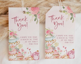 May include: Two pink and white thank you tags with floral designs and teacups. The text reads "Thank You! I hope you had a magical time at my first par-tea!"