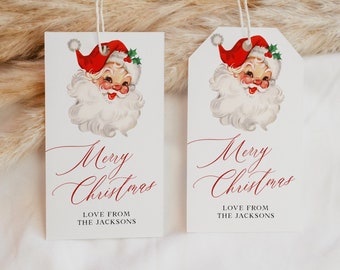 May include: Two white gift tags with a vintage illustration of Santa Claus. The tags have red text that says "Merry Christmas" and "Love from The Jacksons".