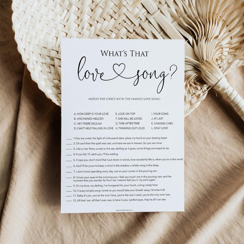 May include: A printable game with the title "What's That Love Song?"  Players match lyrics to famous love songs. The game includes 12 lyrics and 12 song titles.