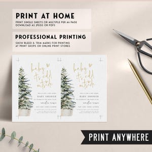 May include: A baby shower invitation with a watercolor illustration of a snowy pine tree. The text reads "baby it's cold outside" in gold script. The invitation is for a baby shower to celebrate the mama to be, Emilia Rose, on Saturday, December 22nd at 6:30pm.