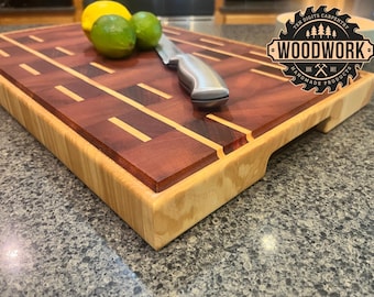 Tabla de cortar de veta final - Doble línea en fresno, caoba y padauk