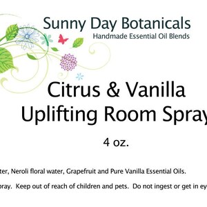 May include: A floral design with a white background and the text "Sunny Day Botanicals Handmade Essential Oil Blends Citrus & Vanilla Uplifting Room Spray 4 oz. Ingredients: Distilled water, Neroli floral water, Grapefruit and Pure Vanilla Essential Oils. Usage: Shake well and spray. Keep out of reach of children and pets. Do not ingest or get in eyes."