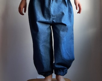 Loose fit denim trousers with elastic waist and cuffs