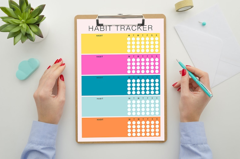 May include: A habit tracker with five colorful sections, each with a "HABIT" label and a grid of circles for tracking daily progress. The days of the week are labeled "M" through "S" across the top of each section.