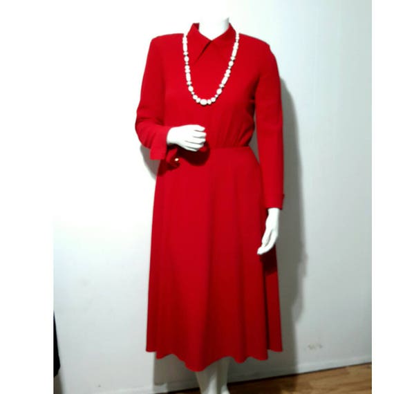 red dress with gold buttons