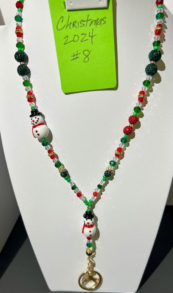Unique One-Of-A- Kind Breakaway Lanyard - Christmas 2024 #8 - Slightly Irregular Red, White, Green & Clear Beads with 2 Ceramic Snowmen