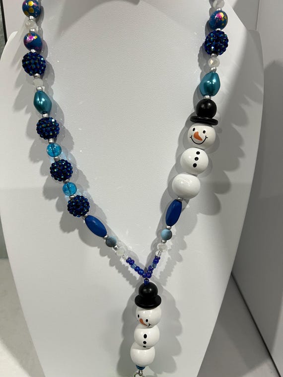 Christmas 23 - Unique One-Of-A- Kind Breakaway Lanyard - 2 Wooden Snowmen Created From Beads With White, Teal and Blue Accent Beads