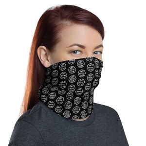 May include: A black face mask with a white repeating pattern of the words "Anti Social Club".