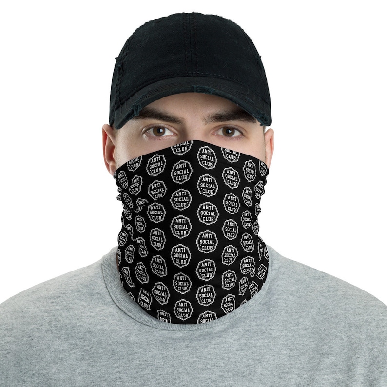 May include: Black face mask with a white repeated pattern of "Anti Social Club" in a circle.