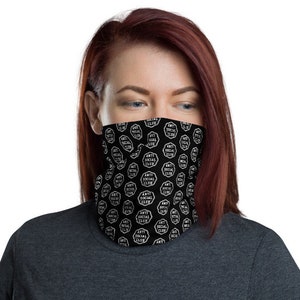 May include: A black face mask with a white repeating pattern of the words "Anti Social Club".