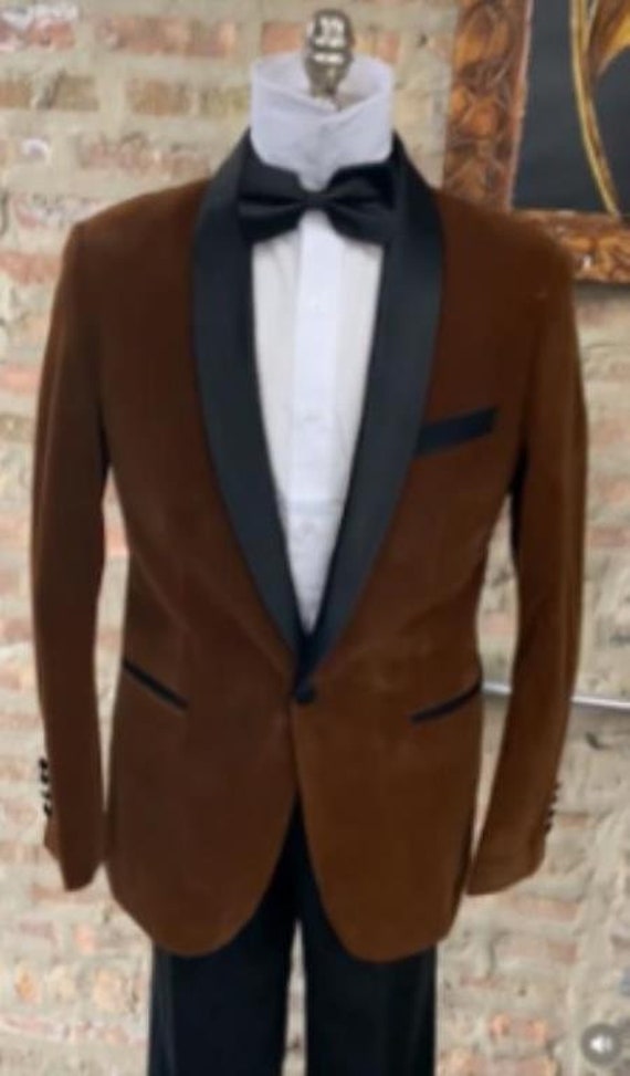 Premium AI Image | a man in a brown jacket and black pants