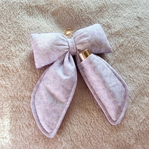 Cutesy Puffy Bow Lip Balm Holder Keychain - Lavender Purple Soft Cloud Lipstick Lipgloss Holder - Tote Bag Backpack Accessory Charm