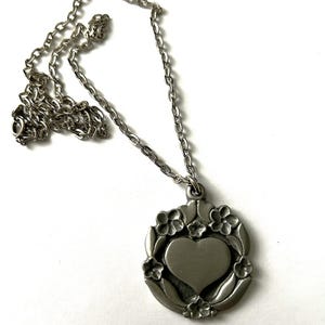 Signed Pendant Necklace R. Tennesmed in pewter with heart and flowers from Sweden.