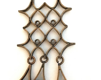 Necklace by the artist Pipa Niinimäki in bronze Turun Hopea Koru pendant Finland.