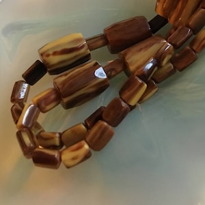 Old Huge Bakelite necklace in large brown flamed color, tested positive with semichrome from 1940's.