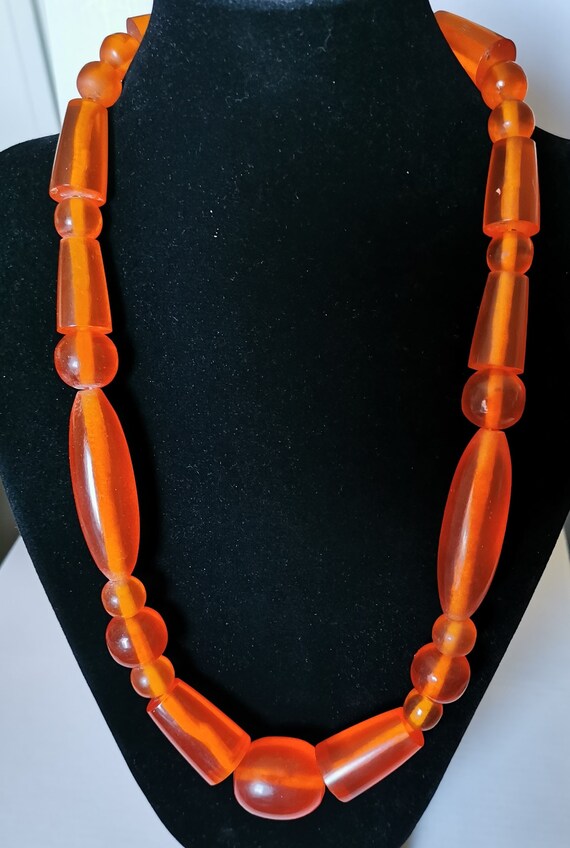 Orange Necklace plastic/ Lucite/ Resin orange colo