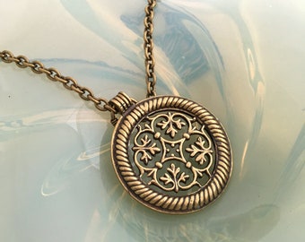 Old Kalevala Koru large round pendant with chain in Bronze from Finland.