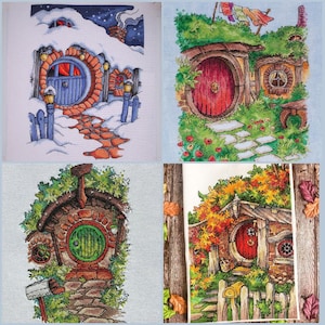 May include: A collection of four cross-stitch artworks depicting whimsical hobbit-hole homes. Each scene features a round door, lush greenery, and charming details like snow, autumn leaves, and stone pathways. The artwork is framed with a light blue background.