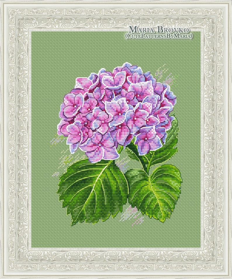 May include: A cross-stitch pattern featuring a pink and purple hydrangea flower with green leaves on a light green background. The pattern is titled "Maria Brovko (CutePatternsByMaria)".