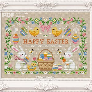 May include: A framed cross-stitch pattern with a beige background, featuring Easter-themed elements. The design includes bunnies, chicks, decorated eggs, a basket of eggs, and the text "HAPPY EASTER". Floral borders and decorative elements complete the festive scene.