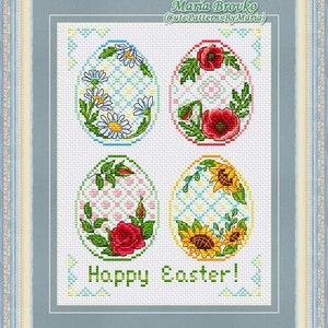 May include: Four colorful Easter eggs with floral designs. The eggs are decorated with daisies, poppies, roses, and sunflowers. The text "Happy Easter!" is written below the eggs.