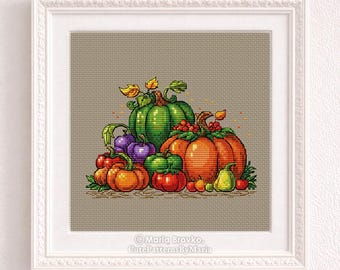 May include: Cross-stitch pattern of a fall harvest scene, featuring a variety of pumpkins, gourds, and other produce in shades of orange, green, purple, and red. The artwork is framed in a white, ornate frame, with the text "PDF cross stitch pattern" at the top.