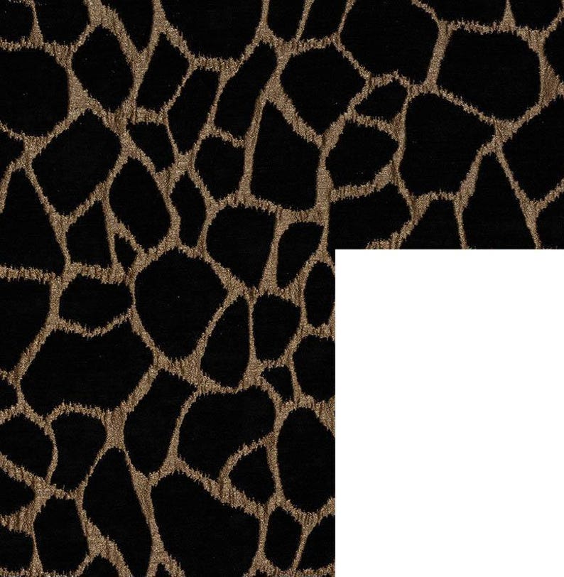 May include: Black fabric with a gold animal print pattern. The print resembles a giraffe pattern.