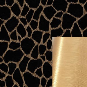 May include: Black fabric with a gold animal print pattern. A close-up of the fabric shows the texture and sheen of the gold thread.