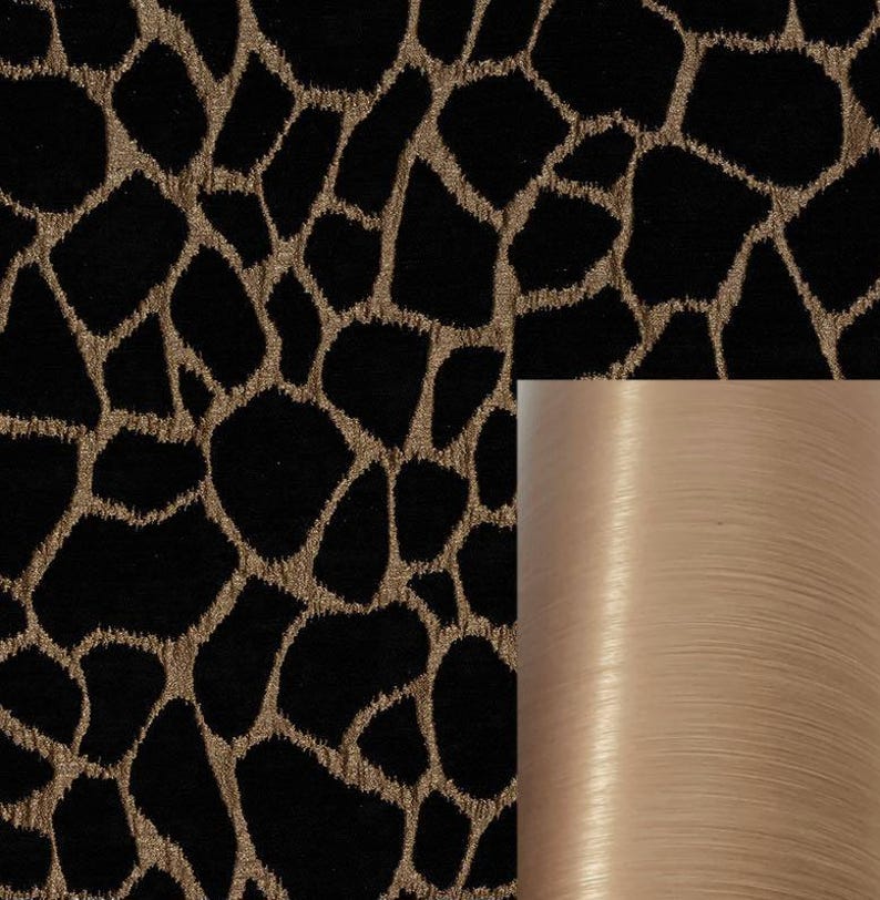May include: Black fabric with a gold animal print pattern. A close-up of the fabric shows the texture and sheen of the gold thread.