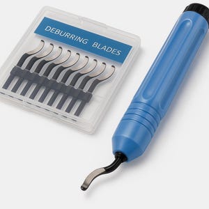 May include: A set of 10 deburring blades in a clear plastic case with the text "Deburring Blades" on the lid. A blue plastic handle with a single deburring blade attached.