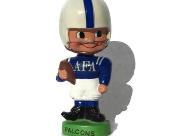 1960's Bobblehead Air Force Academy AFA Falcons Bobble Head with toes up & green base made in Japan sports nodder USAF military gift