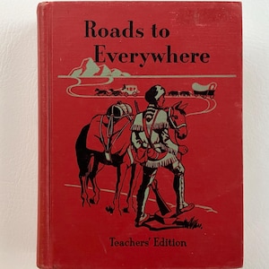 May include: A red hardcover book titled "Roads to Everywhere" with a black and white illustration of a person riding a horse on the cover. The book also says "Teachers' Edition" on the bottom.