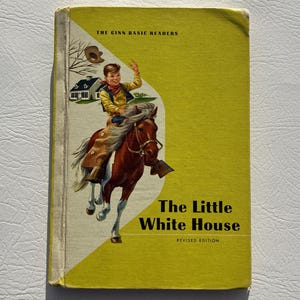 May include: Vintage book cover for "The Little White House" by The Ginn Basic Readers. The cover is yellow with an illustration of a boy riding a brown horse. The boy is wearing a yellow shirt and waving. A white house is in the background.