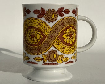 1970's mod flower power hippie coffee mug with groovy braid and pedestal base floral retro tea cup vintage kitchen boho fun home decor