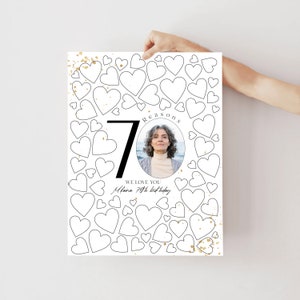 May include: A printable poster with a black and white outline of a heart design. The poster has a large number "70" in black and a photo of a woman in a circle. The text "Reasons" is above the photo and the text "We love you [Name] 70th birthday" is below the photo. The poster has a gold glitter effect.