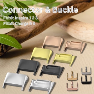 Puede incluir: Un conjunto de conectores y hebillas para correas de reloj en varios colores, incluyendo plata, oro, negro y oro rosa. El texto "Connector & Buckle" y "Fitbit Inspire 123 Fitbit Charge 5 6" es visible en la imagen.