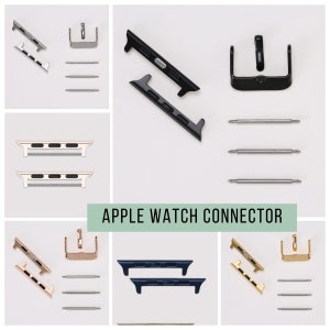 Könnte beinhalten: Apple Watch-Verbindungsstücke in Gold, Silber, Schwarz und Blau. Jeder Verbinder besteht aus zwei Teilen, die an ein Armband befestigt werden. Die Verbinder werden mit den Stiften gezeigt, die am Armband befestigt werden.