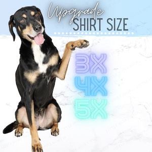 May include: A black and tan dog with a white patch on its chest sits on a white marble background. The dog is looking at the camera and has its tongue sticking out. The dog's right paw is raised, pointing to the right side of the image. The text "Upgrade Shirt Size" is written in black at the top of the image. The text "3X", "4X", and "5X" is written in neon blue and green on the right side of the image.